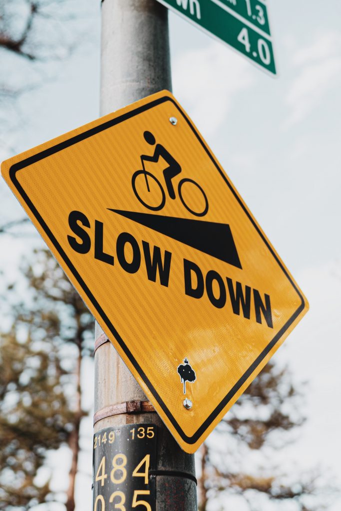 slow down sign to visually represent slow parenting style